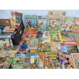 A selection of period books and annuals including Flintstones, Rupert and others.