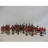 A tray of Britains playworn household cavalry plus a collection of standing bandsmen etc.