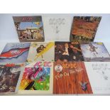 Eleven ACDC albums and 12" picture covers.