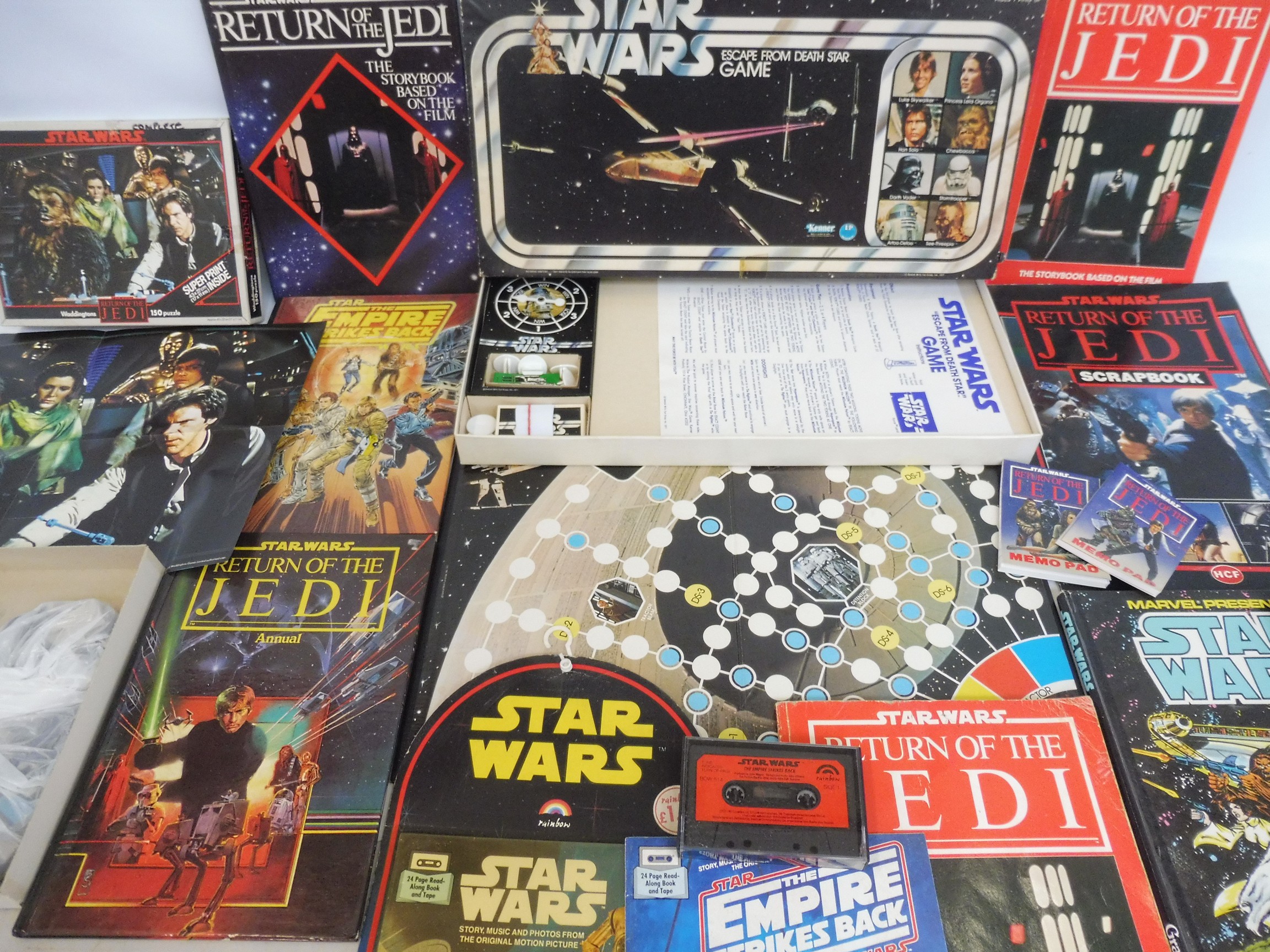 A collection of Star Wars games, merchandise etc.