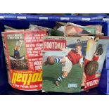 A large box of Charlie Buchan Football Monthly magazines.