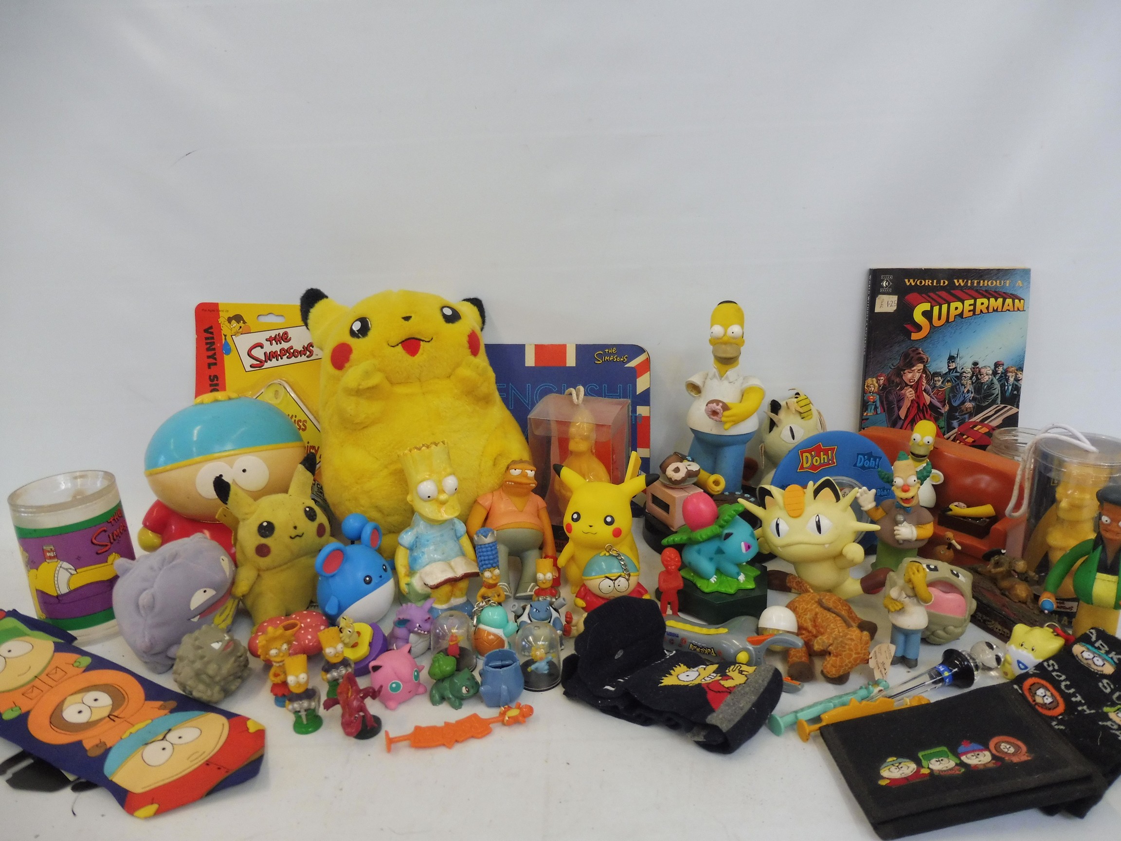 A selection of Simpsons collectables and others.