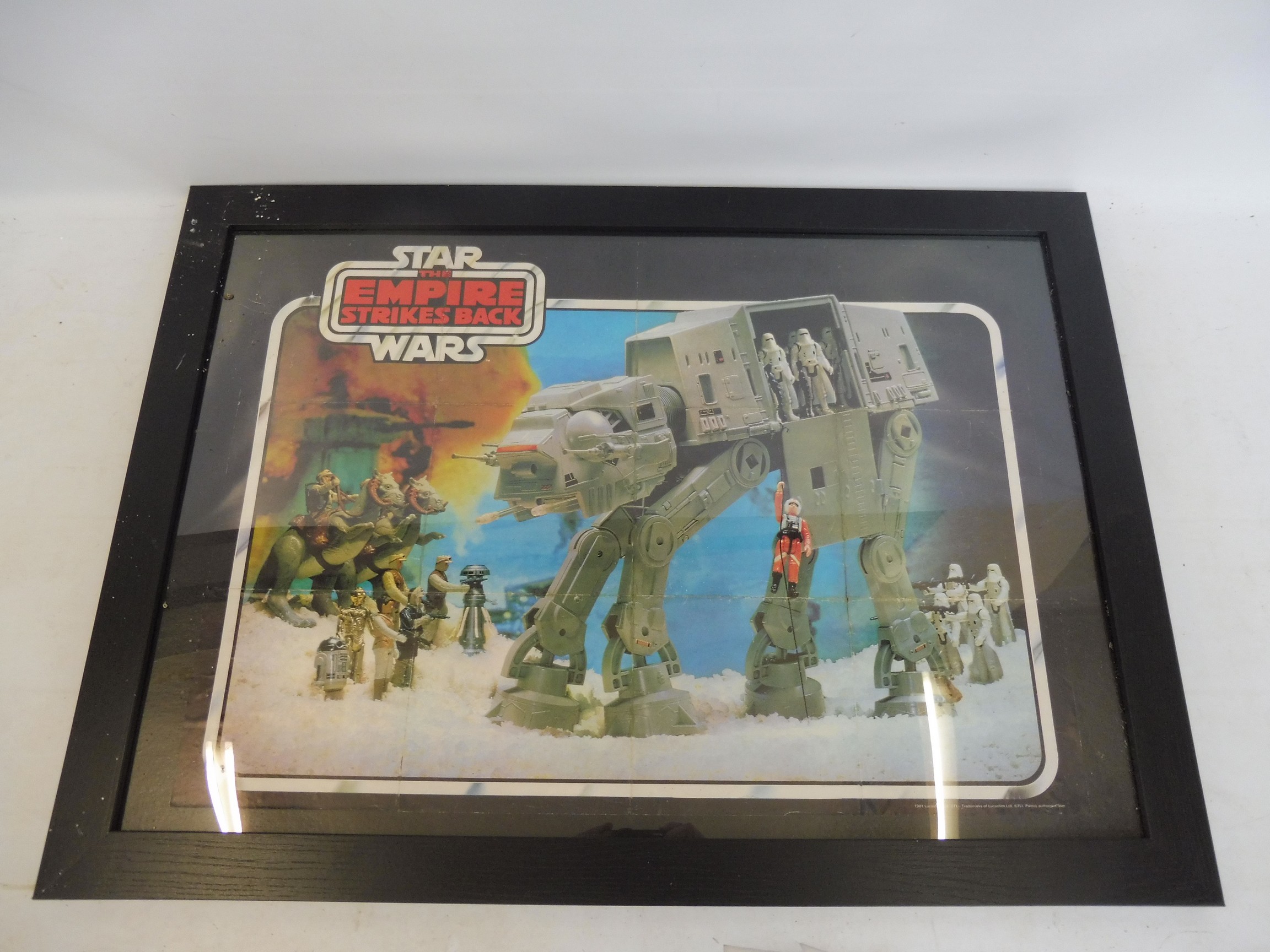 A Star Wars Empire Strikes Back AT AT poster, original from the film, framed.