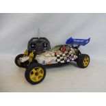 A Kyosho Sand Master Mk II - a buggy circa 1988 with a GT-125 CR nitro engine and ACOMS controller.