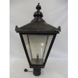 A Victorian style square tapering street lantern.