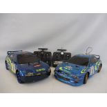 Two Subaru Impreza car models - the first a front wheel drive, the other a 4WD, both 1/10 scale both