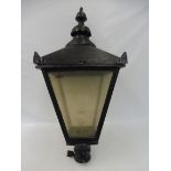 A Victorian style square tapering street lantern.