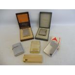 A selection of assorted Zippo and Dupont lighters etc.