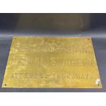 A brass name plaque for 'Reg. C. Graham Dental Surgery', 18 x 12".