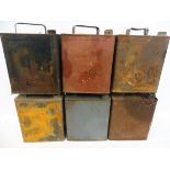 Four War Department two gallon petrol cans, dated 1942, 1943 and 1944, plus two others, two with