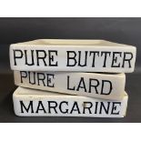 A Pure Butter slab by G. Rushbrooke (Smithfield) Ltd and two others by the same manufacturer, for