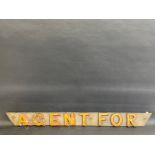 An unusual wooden advertising sign - 'Agent For', with raised lettering, 47 1/4 x 4 1/4".