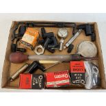 An autojumbler's lot to include Champion spark plug caps/clips, oil can, car bulbs etc.