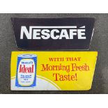 A large hardboard advertising sign for Nestle's Milk, 55 1/2 x 24" plus a second for Nescafe 59 x