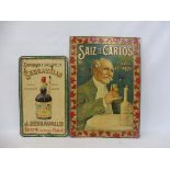 Two foreign pressed tin pictorial advertising signs promoting alcohol, 14 x 20" and 10 x 16".