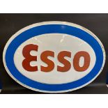 A large oval Esso plastic garage forecourt sign, overpainting to the letter 'E', 45 x 32 1/2".