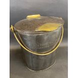 A Hiltonbury Dairy of Chandlers Ford oval polished steel and brass mounted milk pail, also stamped