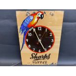 A Sharps Toffee glass fronted advertising wall hanging clock, 12 x 17".