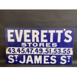 A rectangular enamel sign advertising Everett's Stores, St. James St. 36 x 20".