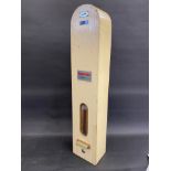 A vending machine for tampons, of wooden construction, 7" w x 33 1/2" h x 5" d.