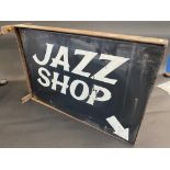 An unusual double sided advertising sign in hanging frame, by repute from a jazz shop in Bath, 24