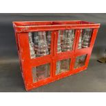 An Essolube 12-division crate containing a full set of correct glass pint oil bottles.