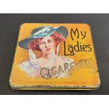 A 'My Ladies' Cigarettes tin with an illustration of a glamorous lady to the lid.