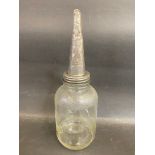 A Mobiloil 'A' grade American glass oil bottle with embossed conical lid.