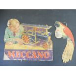 A Cox DDT parrot hanging advertisement, plus an original Meccano toy shop display board.