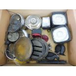 An autojumbler's lot of various lights, war time headlamp shield, bulb holders etc.