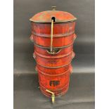 A Wells waste oil filter in original condition, with brass dispensing tap, 24" tall.