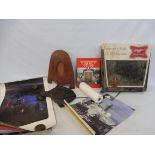 A Miller Beer wall mounted lightbox, a Nut Brown pottery rolling pin, a flying helmet and a roll