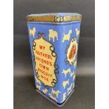 A Spratts dog biscuit tin with image of dogs all over.