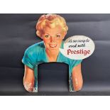 A die-cut showcard advertising 'Prestige', 20 x 21".