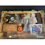 A quantity of automobilia to include oil cans, tins, grease gun, Essolube motor oil glass bottle,