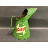 A Castrol Motor Oil half gallon measure.