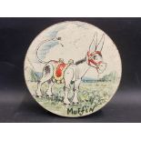 A Huntley & Palmers Muffin the Mule circular biscuit tin.