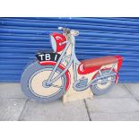 A juvenile handmade wooden fairground motorbike, with original handlebars and seat but has been