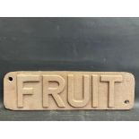 A small 'Fruit' cast iron wagon sign, 16 3/4 x 5".