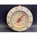 A small circular plastic wall mounted thermometer with Sunbeam branding to the dial.