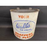 A Wall's Ice Cream 'wrappers here please' semi-circular hanging bin with advertising to the front,