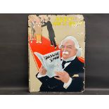 An unusual politically inspired pictorial enamel sign depicting Lloyd George reading a copy of The