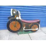A circa 1930s/1940s hand made fairground motorbike with fantastic artwork, original handlebars and