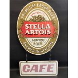 A Stella Artois oval double sided advertising sign, with a Cafe sign attachment, 22 1/2" w x 41 1/2"