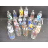 22 early glass milk bottles, all with advertising on, including Ty-Phoo, Bowyers, Blue Riband etc.