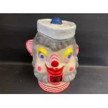 A attractive fairground head, handpainted stylised sailor figure.