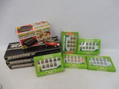 A quantity of Scalextric track, boxed, C450 soundtrack and five 1980s Subbuteo teams.