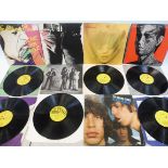 Five Rolling Stones albums, to include a near mint copy of Sticky Fingers with metal zip and insert,
