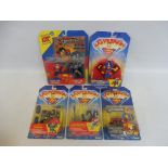 Five Kenner Superman carded figure and action sets, generally good condition.