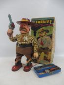 A boxed Sheriff with smoking gun made by Cragstan Toys, Japanese battery operated, with a slave